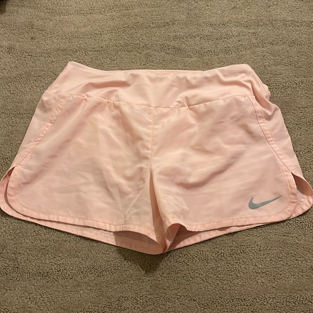 light pink nike athletic shorts (small)
